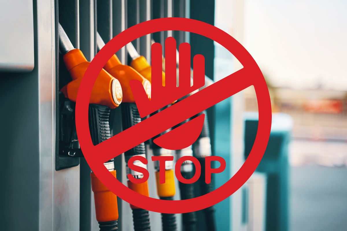 pompa di benzina e grafica stop